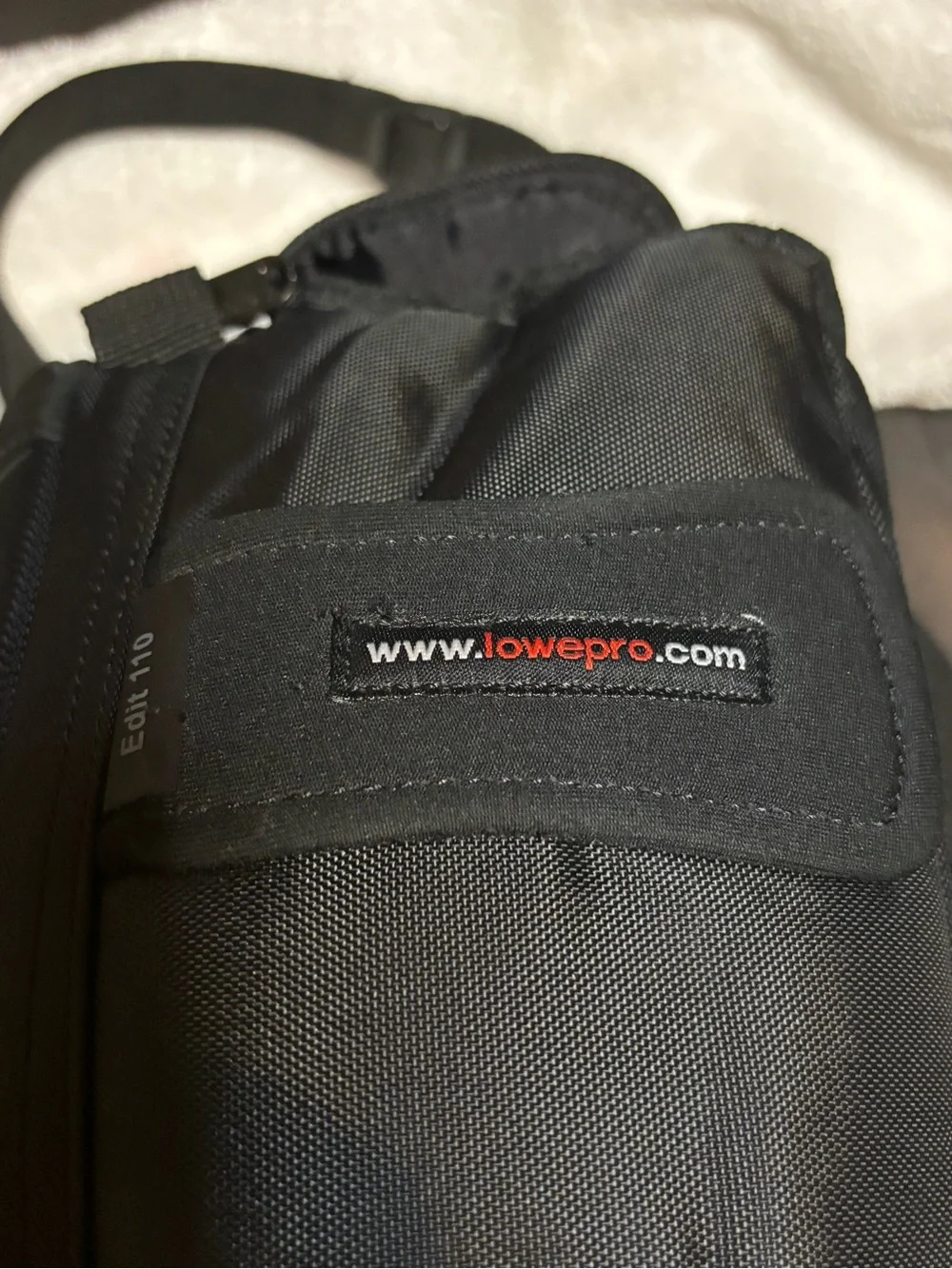 Lowepro Black Camera Shoulder Bag with Compact Holster and a free bag.